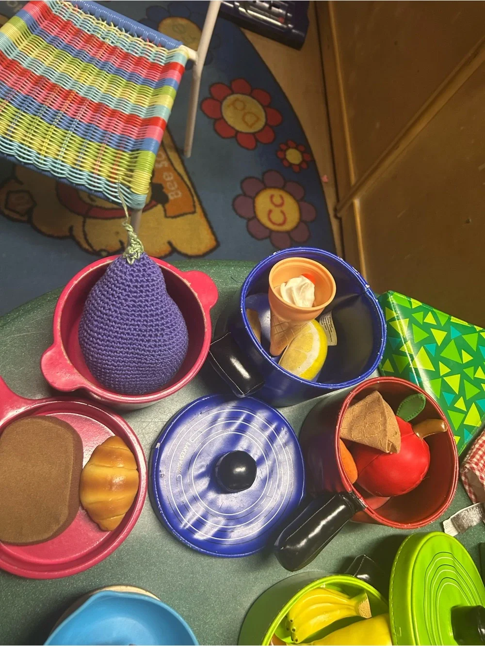 Kitchen play- colorful pans, food and wooden mixer